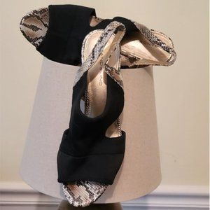 BLACK AND SNAKE OPEN TO BANDOLINO HEELS